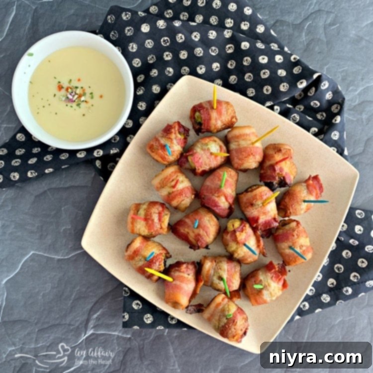 Bacon Wrapped Hot Brussels Sprouts with smoked white cheddar cheese sauce