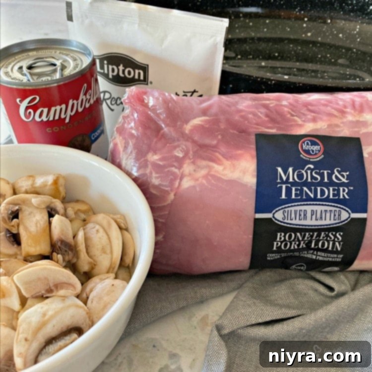 Four simple ingredients for Fuggedaboutit Pork Roast: pork loin, cream of mushroom soup, onion soup mix, and fresh mushrooms.