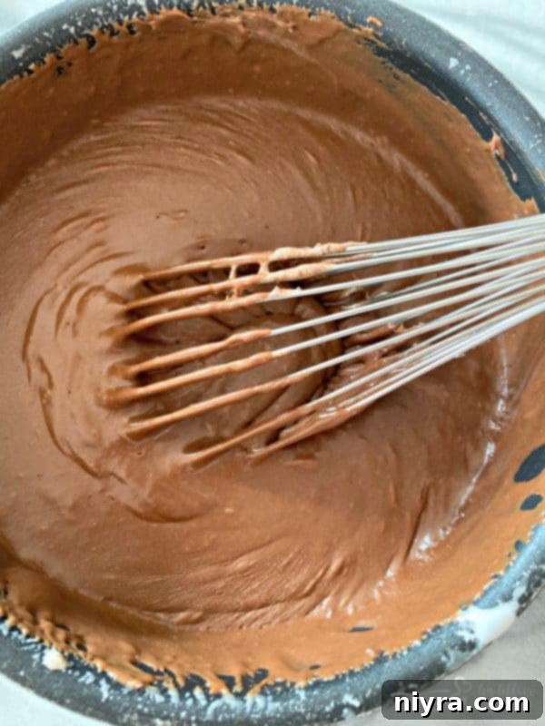 Never Fail Fudge Recipe Stirring chocolate fudge