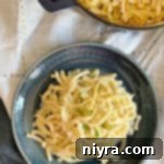 Polish Kluski and Sauerkraut 13 Polish Noodles & Kraut - kluski kapusta kiszona on a blue plate