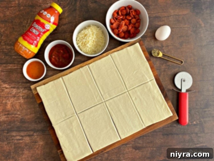 Dorothy's Pizza Pockets Prep - Rolling out puff pastry.