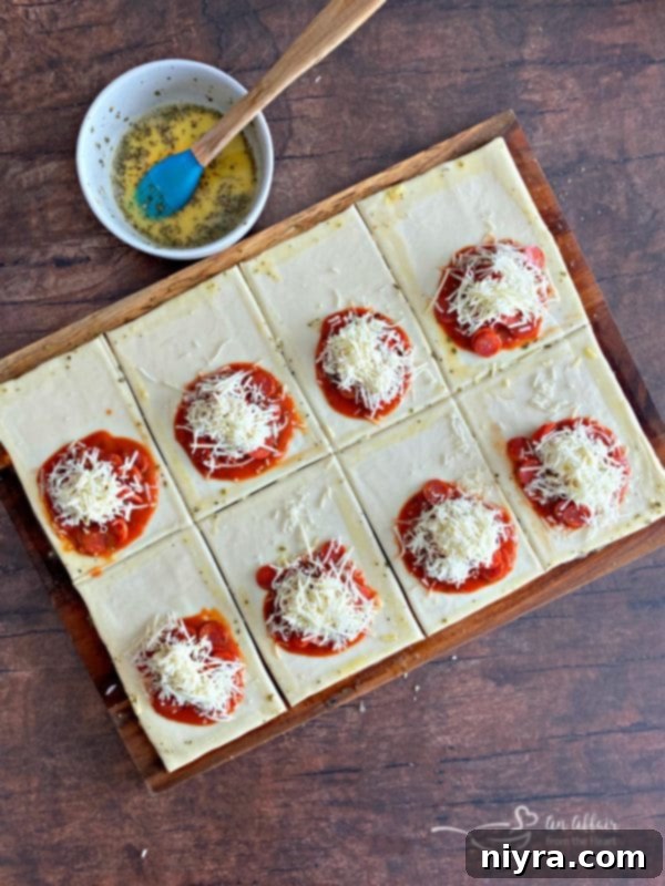 Dorothy's Pizza Pockets Prep - Topping with pepperoni and cheese.