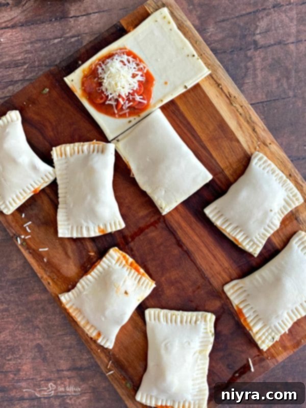 Dorothy's Pizza Pockets Prep - Folding and sealing.