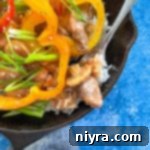 Close image of pepper steak in pan