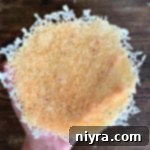 Parmesan Cheese Bowls in hand, showing edible design