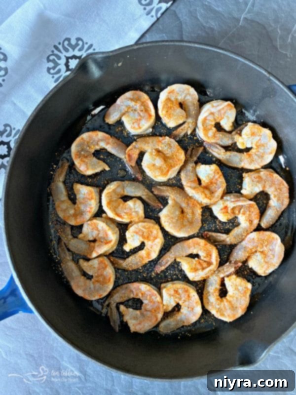 Spicy Caribbean Shrimp Appetizer preparation in skillet