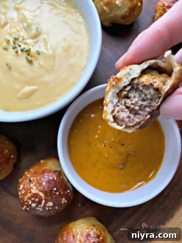 Sausage Pretzel Bombs with Tangy Cheese Dip 17 Sausage Pretzel Bombs served with Herbal Gatherings Mustard in a small dish