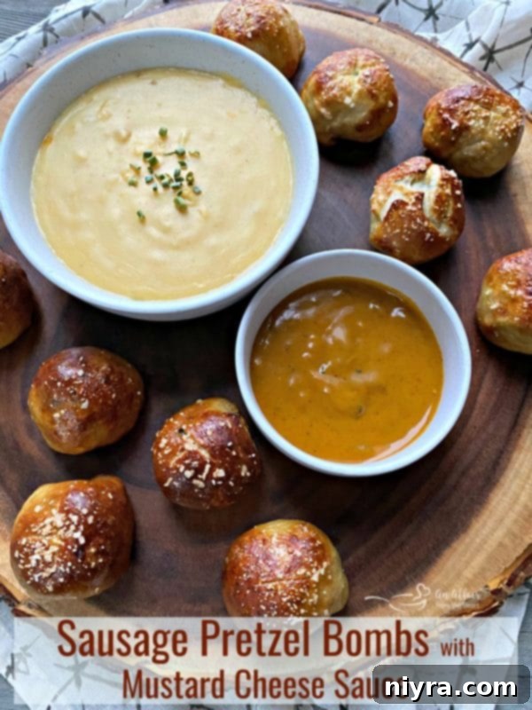 Sausage Pretzel Bombs with Tangy Cheese Dip 19 Hero shot of Sausage Pretzel Bombs with Mustard Cheese Sauce