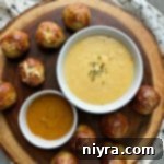 Sausage Pretzel Bombs with Tangy Cheese Dip 21 Top view Appetizer recipe Sausage Pretzel Bombs with Mustard Cheese Sauce