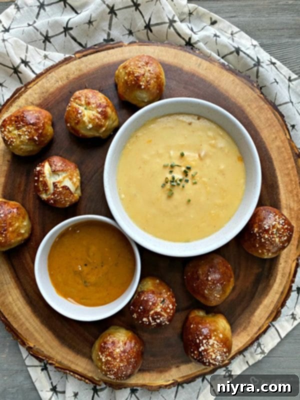 Sausage Pretzel Bombs with Tangy Cheese Dip 6 Close-up of appetizer recipe Sausage Pretzel Bombs with Mustard Cheese Sauce