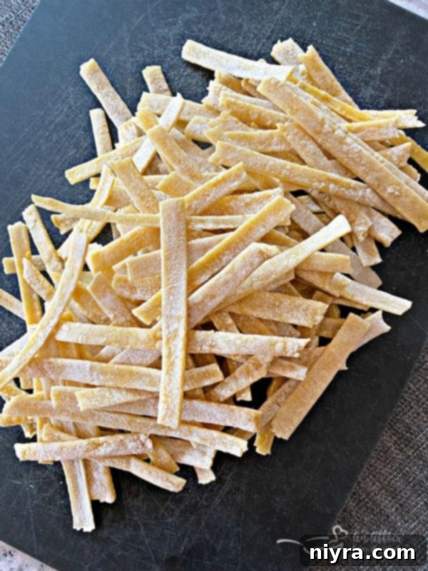 Dried homemade egg noodles ready to be cooked