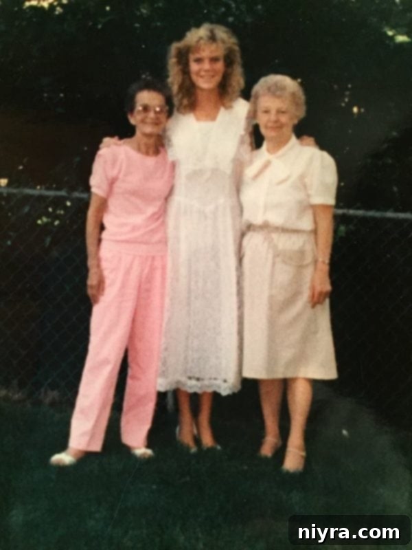 Author with her two grandmothers at high school graduation
