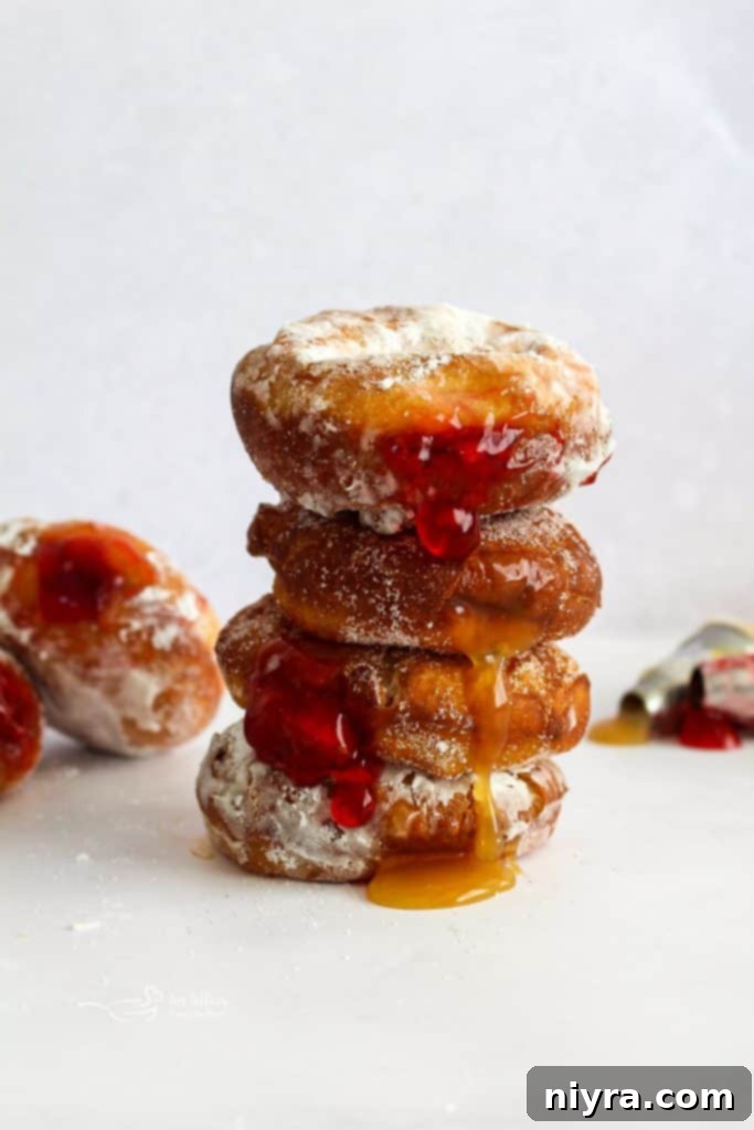 Pączki: The Ultimate Polish Donuts Video 4 A basket overflowing with homemade Paczki, dusted with powdered sugar, ready to be enjoyed.