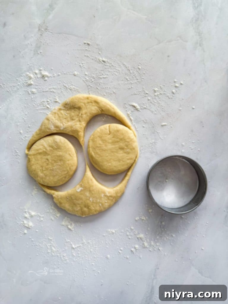 Pączki: The Ultimate Polish Donuts Video 10 Dough rising in a bowl, covered with a towel, demonstrating the first proofing stage.