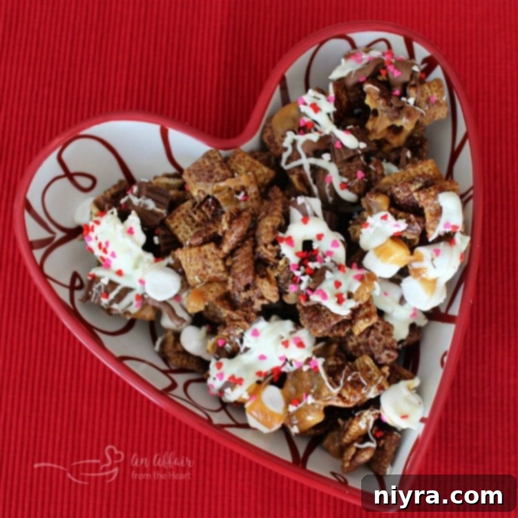 Decadent Better Than Sex Chex Mix featuring chocolate, marshmallows, and caramel