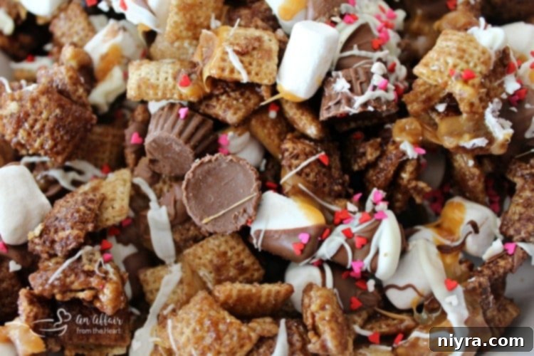 Finished Better Than Sex Chex Mix in a heart-shaped bowl