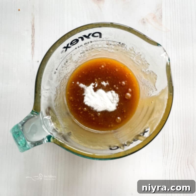 Chocolate Chex cereal in a large bowl, ready for coating