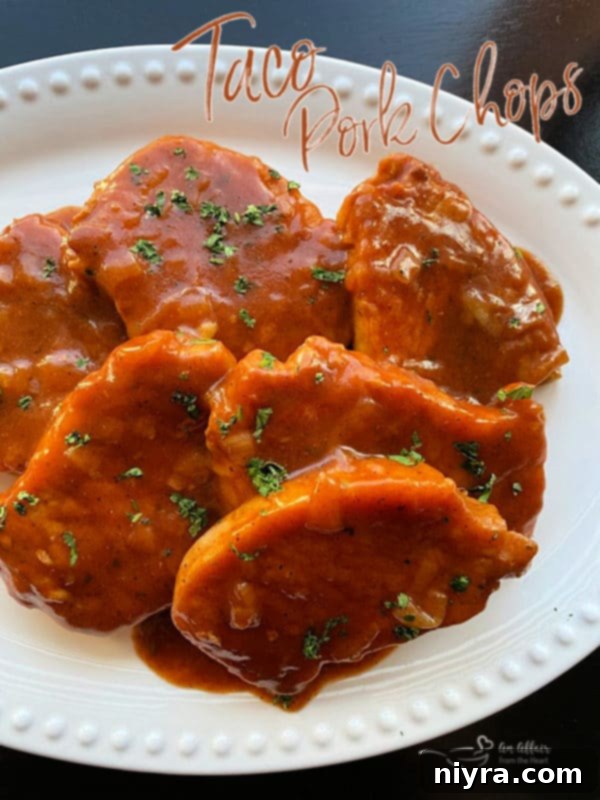 Beautifully plated Taco Pork Chops with a vibrant, spicy sauce, ready to be enjoyed.