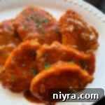 close up Taco Pork Chops on a white serving plate