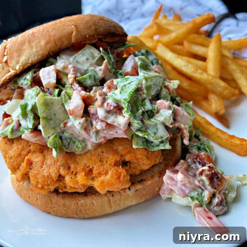 Blackened Salmon Burgers and BLT Slaw 3 Close-up of a grilled salmon burger patty