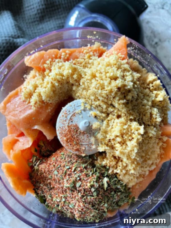 Blackened Salmon Burgers and BLT Slaw 9 Salmon chunks and seasoning in a mini food processor