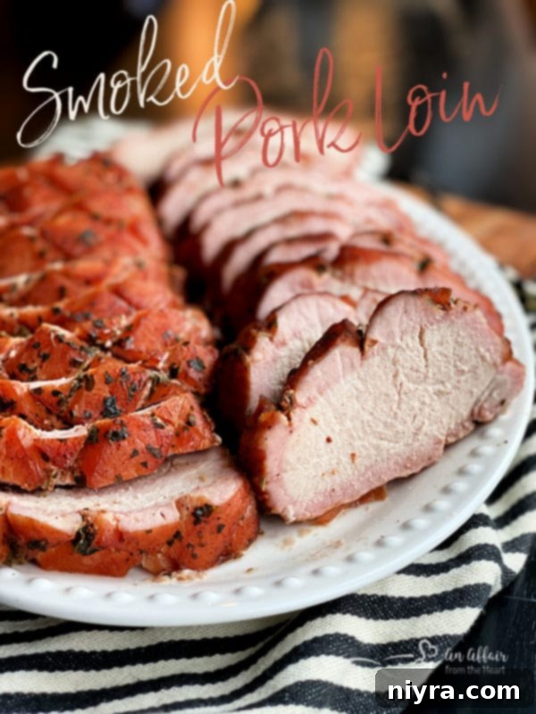 Succulent Smoked Pork Loin 11 Promotional graphic featuring a beautiful smoked pork loin, emphasizing the recipe as a must-make