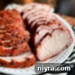 Succulent Smoked Pork Loin 13 Smoked Pork Loin on platter, beautifully sliced