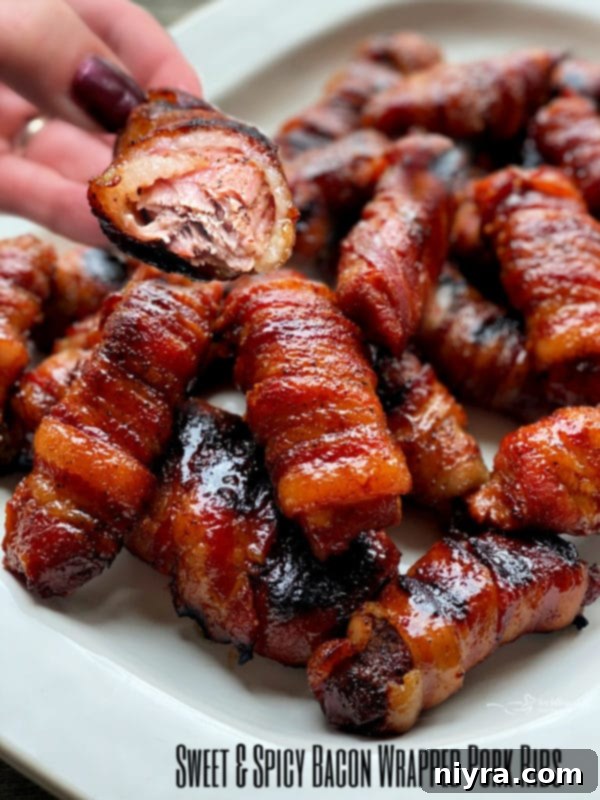 A final close-up of Sweet & Spicy Bacon Wrapped Pork Ribs on a platter, ready to be served.
