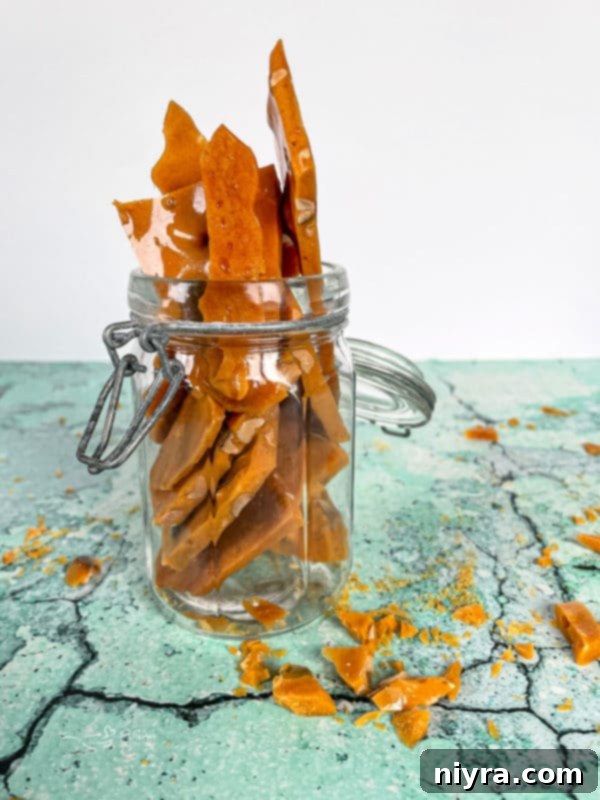 Peanut brittle stored in a glass jar