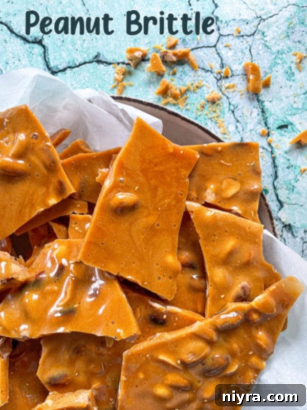 Close-up of golden peanut brittle pieces