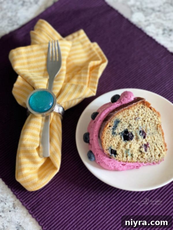 Another view of the Blueberry Banana Bundt Cake, with a slice removed