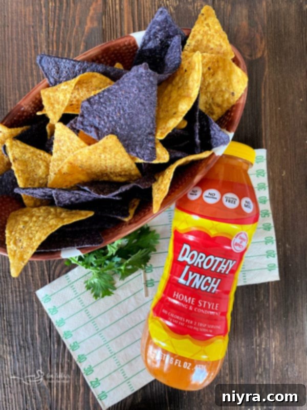 Dorothy's Hot Taco Dip garnished with cilantro and tomatoes