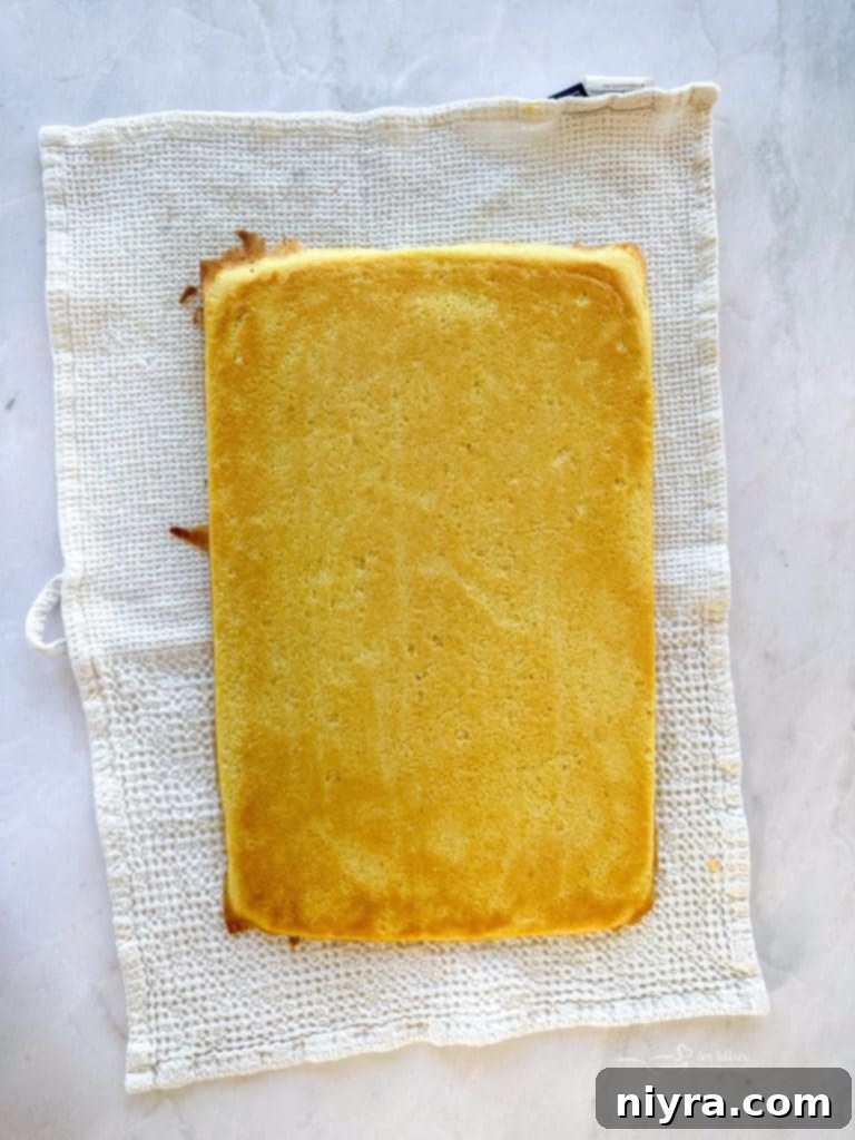 Spreading cake batter into a jelly roll pan