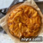 Caramel Apple Flip Cake 10 Overhead view of Apple Upside Down Cake on wooden platter