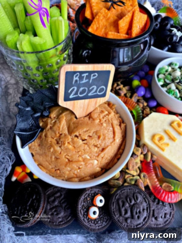 Spooky Sweet and Savory Halloween Snack Board with Peanut Butter Dip 11 A different angle of the Halloween snack board, showcasing more of the sweet treats.