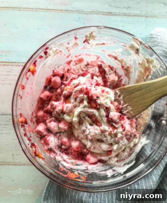 Drained pineapple and salt added to the cranberry mixture.