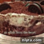 Close up side view of Mint brownie ice cream cake, showing its layered structure.