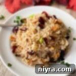 Rice Pilaf with Cranberries and Almonds in a white bowl