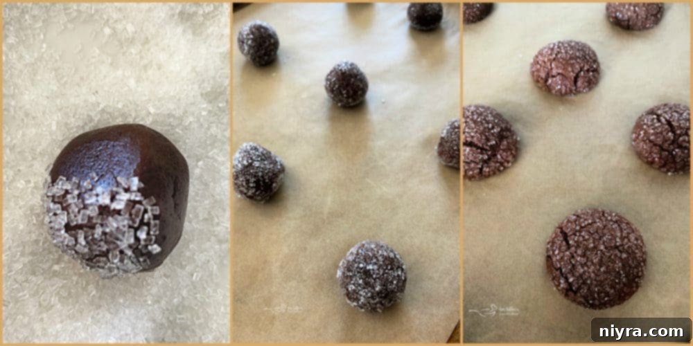 Chocolate Sugar Kiss Cookie dough balls rolled in sparkling sugar crystals, ready for baking on a parchment-lined sheet.