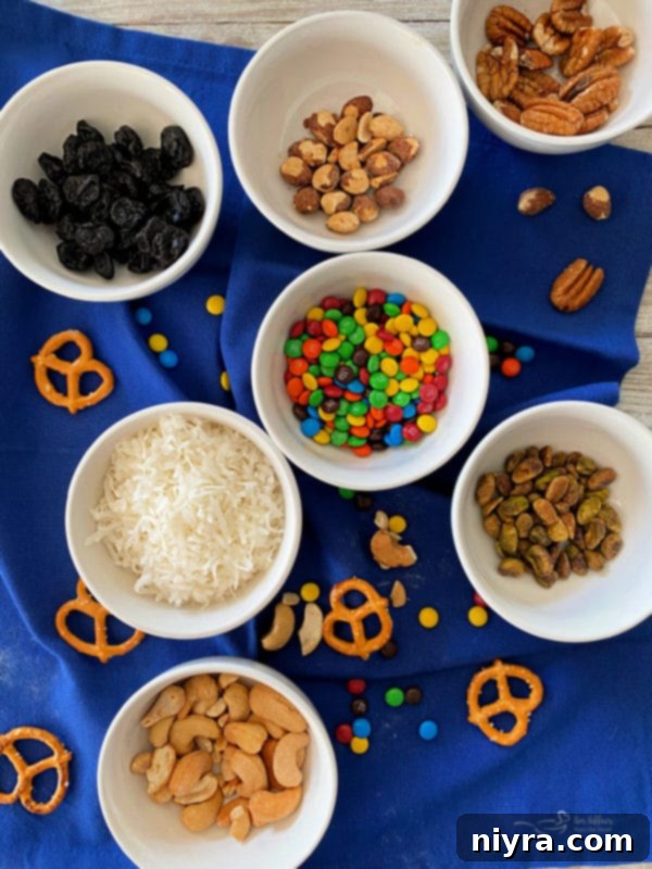 Assortment of homemade chocolate candy cups with various toppings and fillings