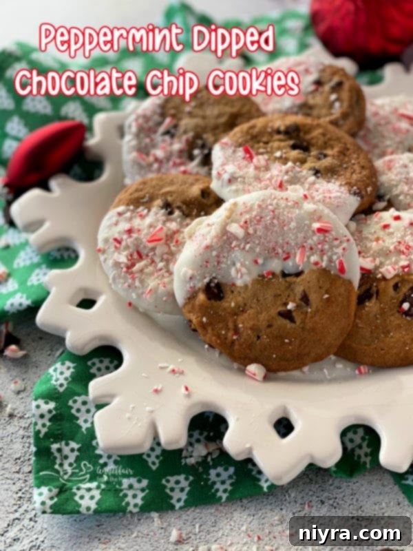 A finished Peppermint Dipped Chocolate Chip Cookie on a festive plate.