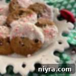 Peppermint Dipped Chocolate Chip Cookies on snowflake plate