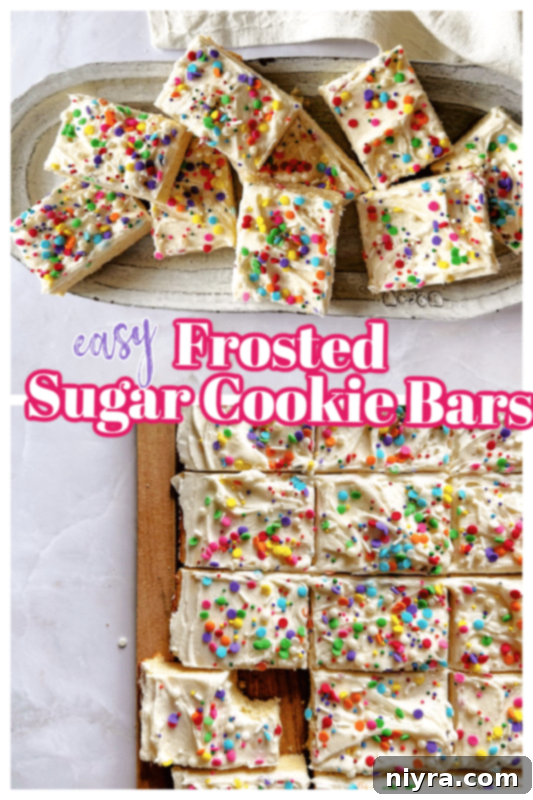 Frosted Sugar Cookie Bars cut into squares on a cooling rack.