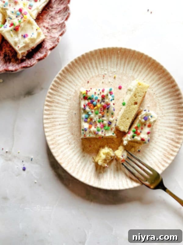 Close-up of Frosted Sugar Cookies on a serving plate.