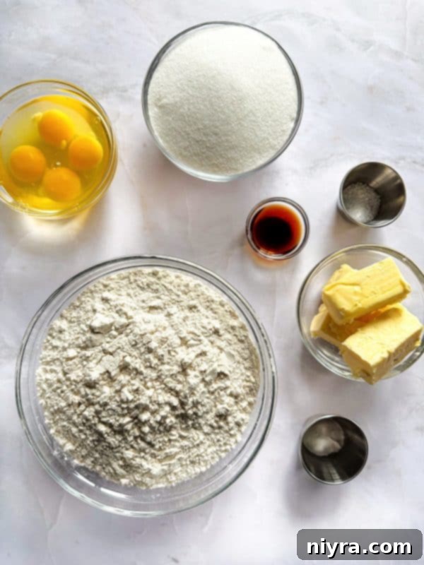 A close-up of a single frosted sugar cookie bar on a white background.