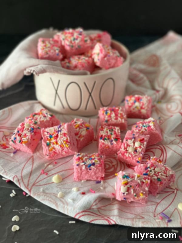 Three squares of Valentine Fudge arranged on a serving dish