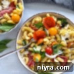 Italian Deli Pasta Salad 13 Two bowls filled with antipasto pasta salad