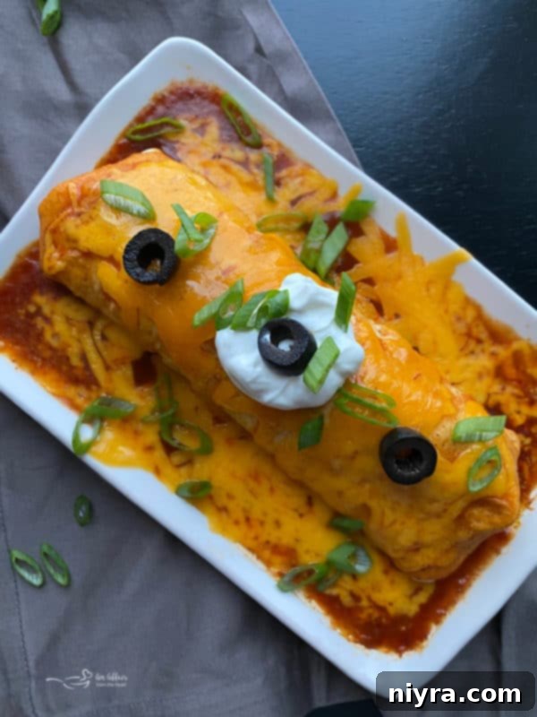 A plate featuring a homemade Taco Bell Enchirito, showing its customizable toppings, including fresh cilantro and possibly sour cream or salsa.