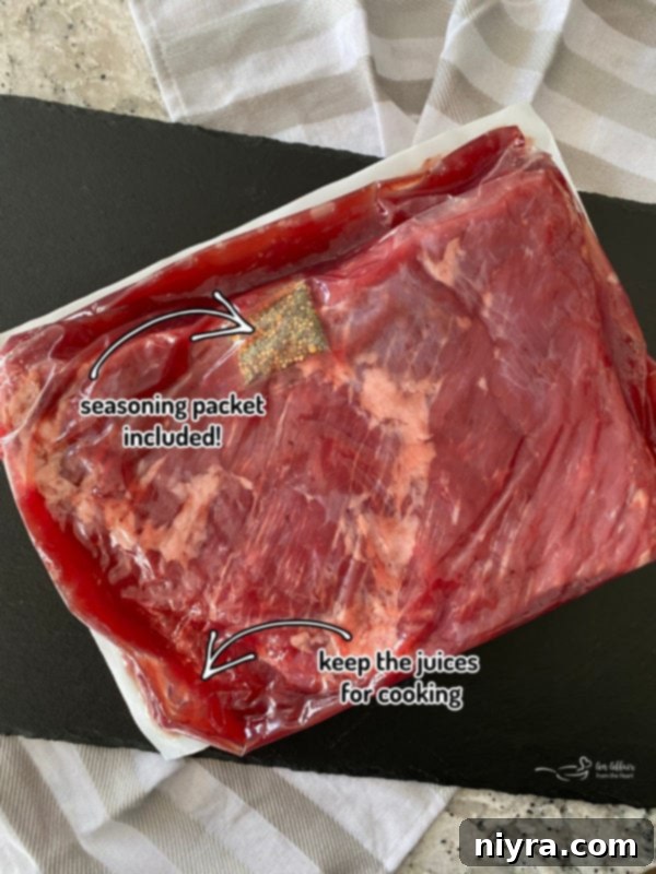 Raw corned beef brisket with seasoning packet