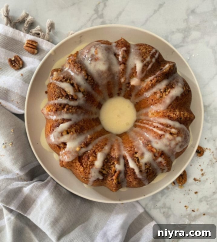Drizzling vanilla sour cream glaze over coffee cake